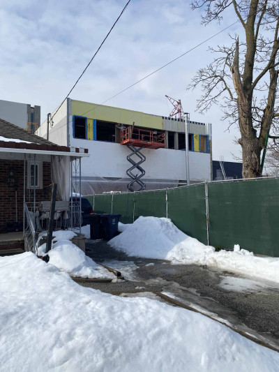 Installing the east windows on the second floor Installing the east windows on the second floor