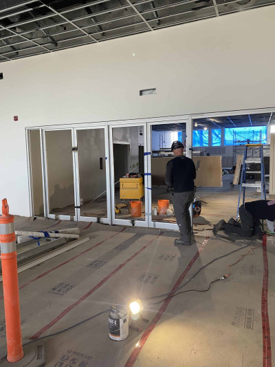 Glass doors being installed between Sanctuary and Community Hall Glass doors being installed between Sanctuary and Community Hall