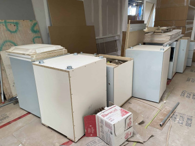 Kitchen cabinetry waiting to be installed Kitchen cabinetry waiting to be installed