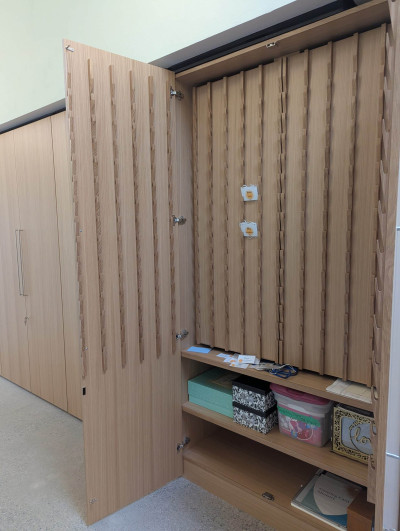 The name tag cabinet on the second floor outside the Community Hall. The other closets are for coats.