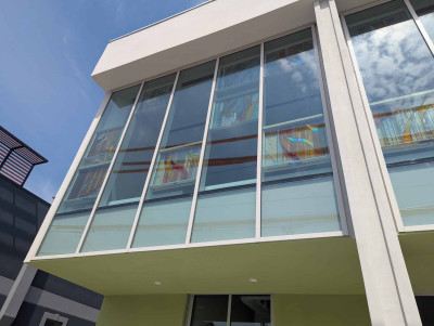 Looking up toward the stained glass windows in the Community Hall