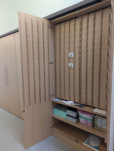 The name tag cabinet on the second floor outside the Community Hall. The other closets are for coats.